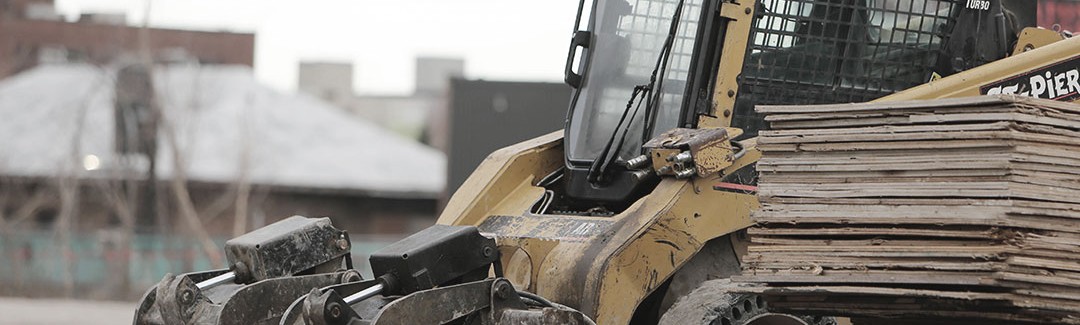 Construction digging machine, highlighting business services which may require you to charge customers gst