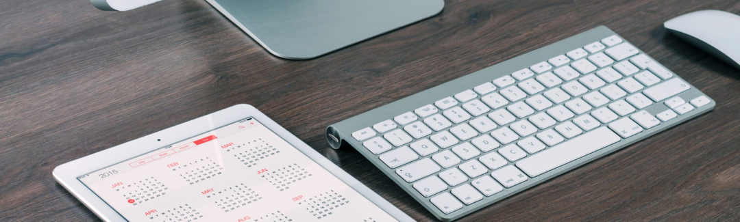 Computer desktop and accessories on a desk, highlighting tax returns that become statute-barred